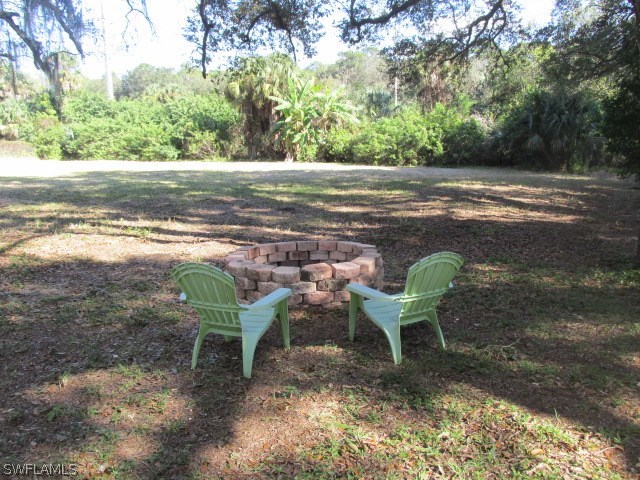 4231 Ellis Road Fort Myers, FL 33905 - Photo 3 of 13 a view of a outdoor space with lounge chair