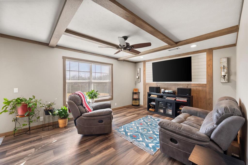 216 Southeast County Road Corsicana, TX 75109 - Photo 12 of 37 a living room with furniture and a flat screen tv