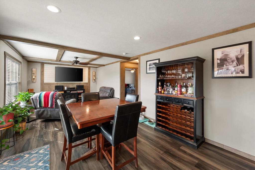 216 Southeast County Road Corsicana, TX 75109 - Photo 15 of 37 a view of a livingroom with furniture and a flat screen tv