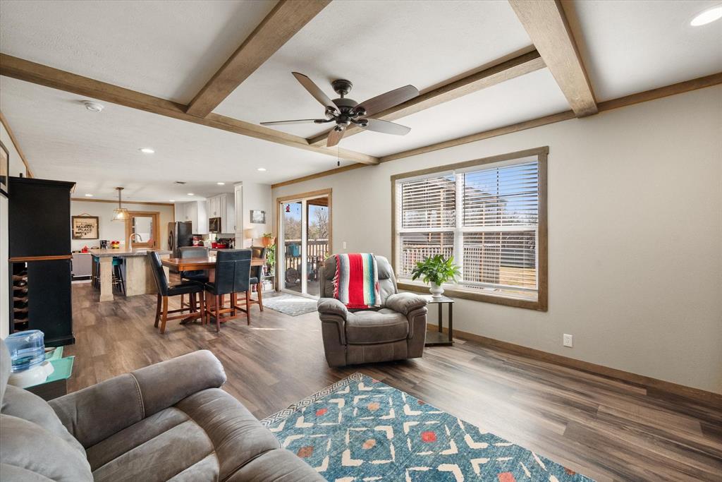 216 Southeast County Road Corsicana, TX 75109 - Photo 18 of 37 a living room with furniture and a window