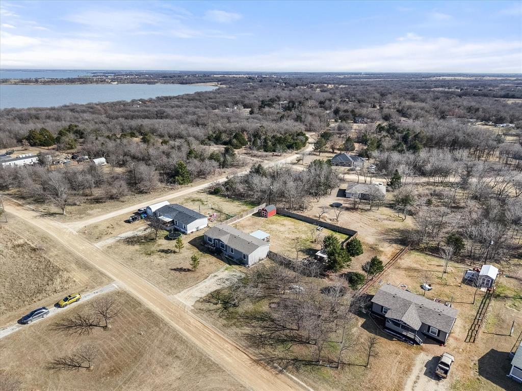 216 Southeast County Road Corsicana, TX 75109 - Photo 3 of 37 an aerial view of residential houses with outdoor space