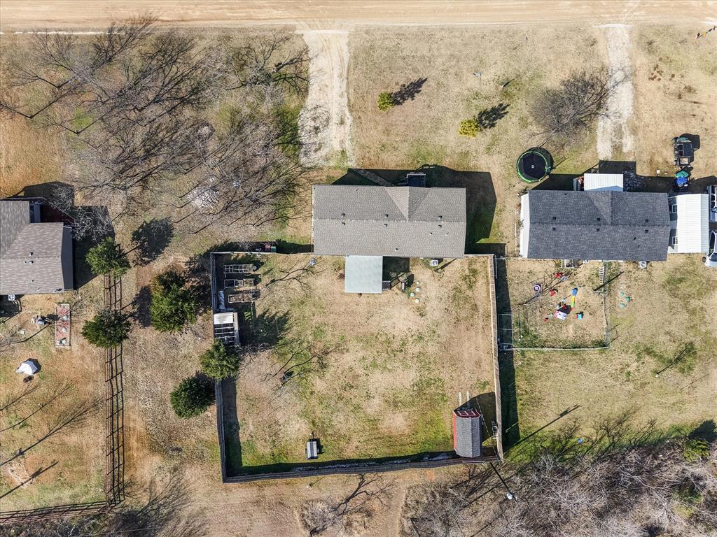 216 Southeast County Road Corsicana, TX 75109 - Photo 32 of 37 an aerial view of a house with a yard