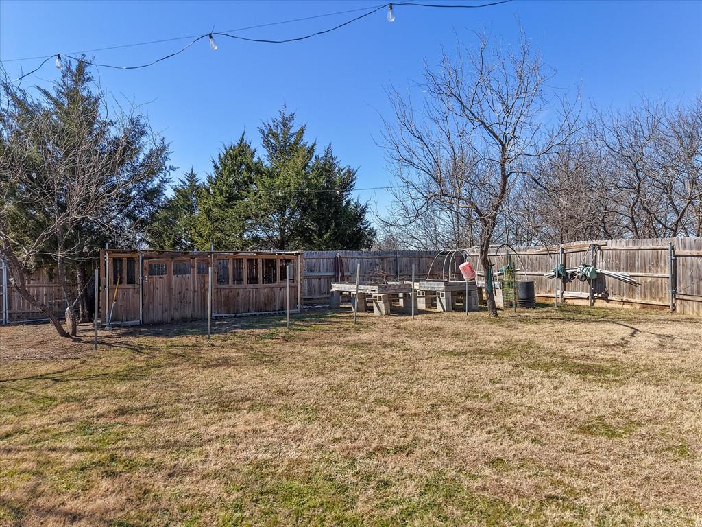 216 Southeast County Road Corsicana, TX 75109 - Photo 37 of 37 a house with trees in the background