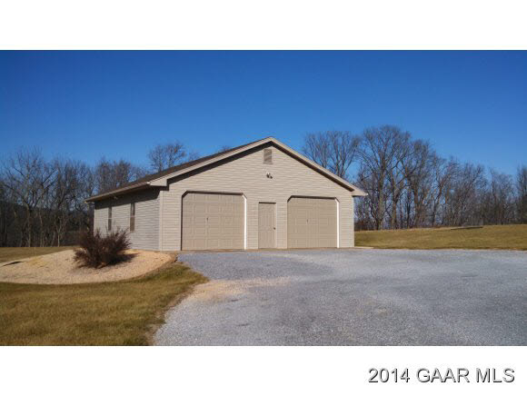 593 Shuey Road Swoope, VA 24479 - Photo 2 of 29 a view of a house with a yard