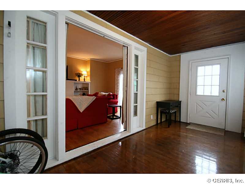 27 Farrington Place Rochester, NY 14610 - Photo 11 of 25 Porch - Enclosed. First Floor Unit #1