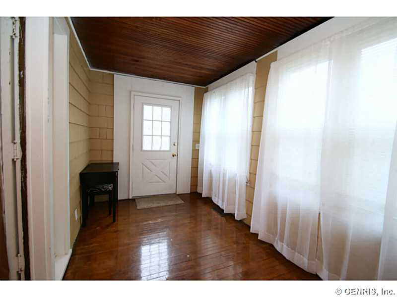 27 Farrington Place Rochester, NY 14610 - Photo 12 of 25 Porch - Enclosed. First Floor Unit #1