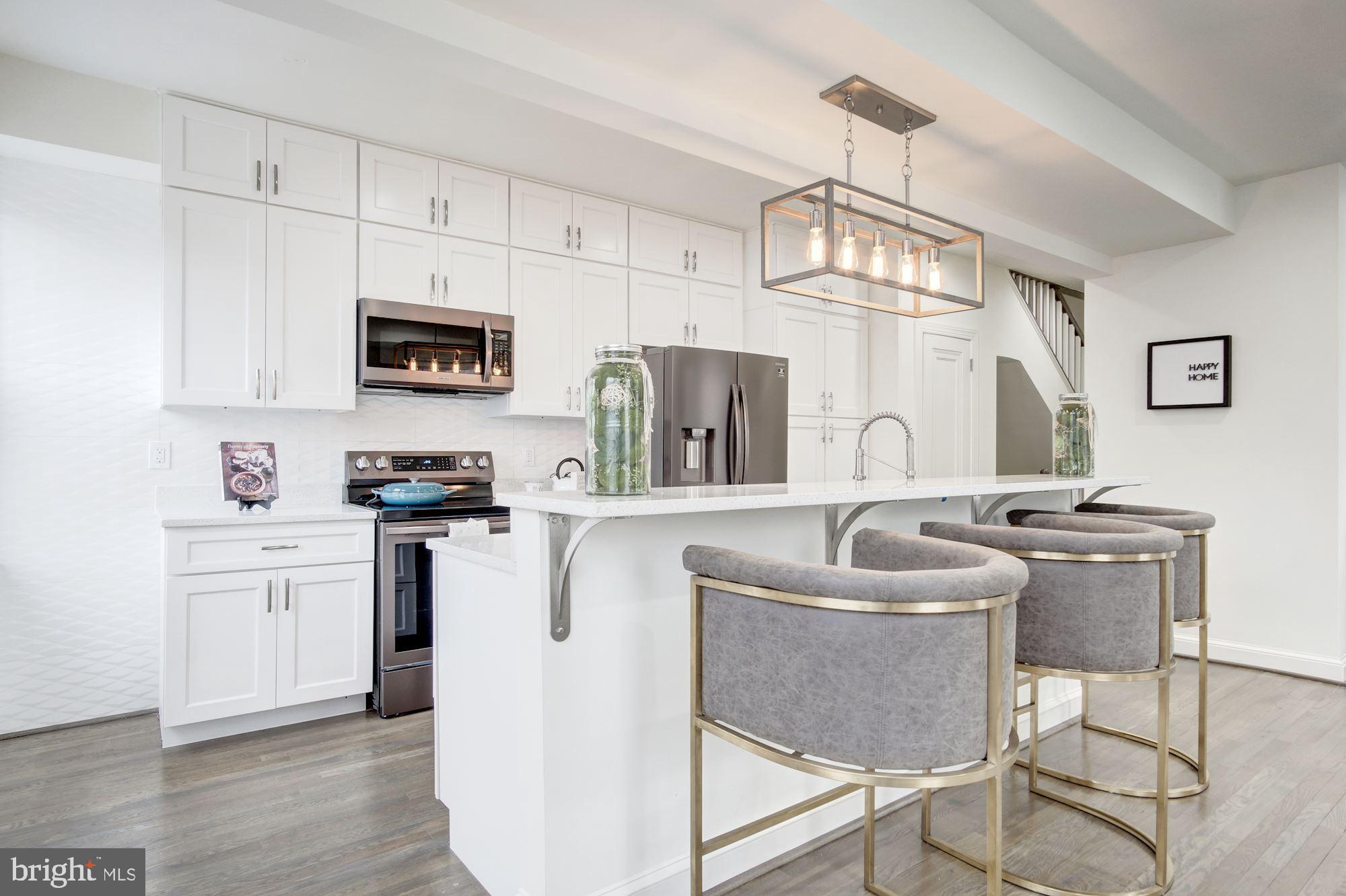 5710 3rd Place Northwest Washington, DC 20011 - Photo 19 of 53 Enjoy New Dining Island and Slow Close Cabinetry