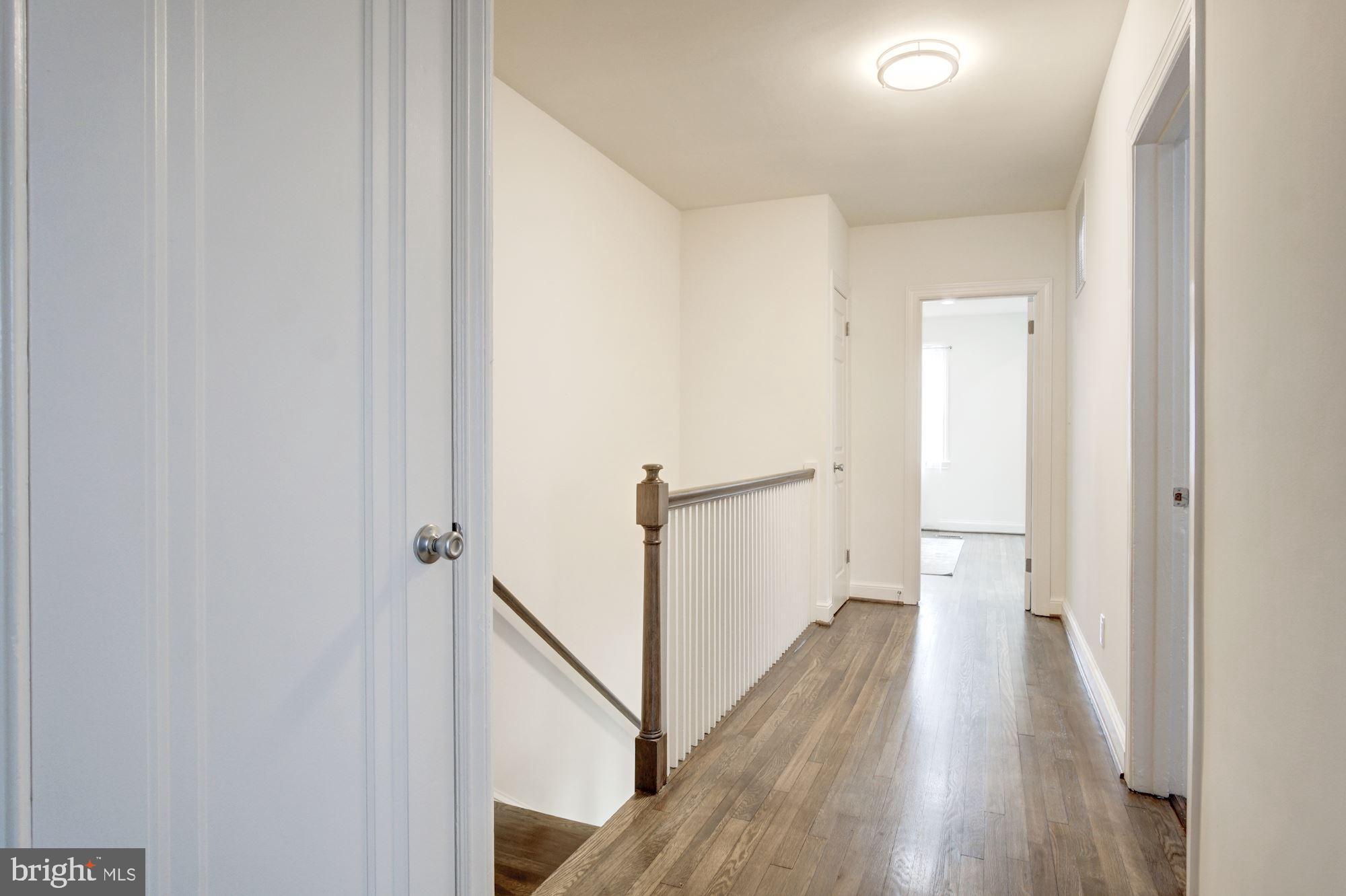 5710 3rd Place Northwest Washington, DC 20011 - Photo 24 of 53 Show Case Upper Hallway with Hardwood Flooring