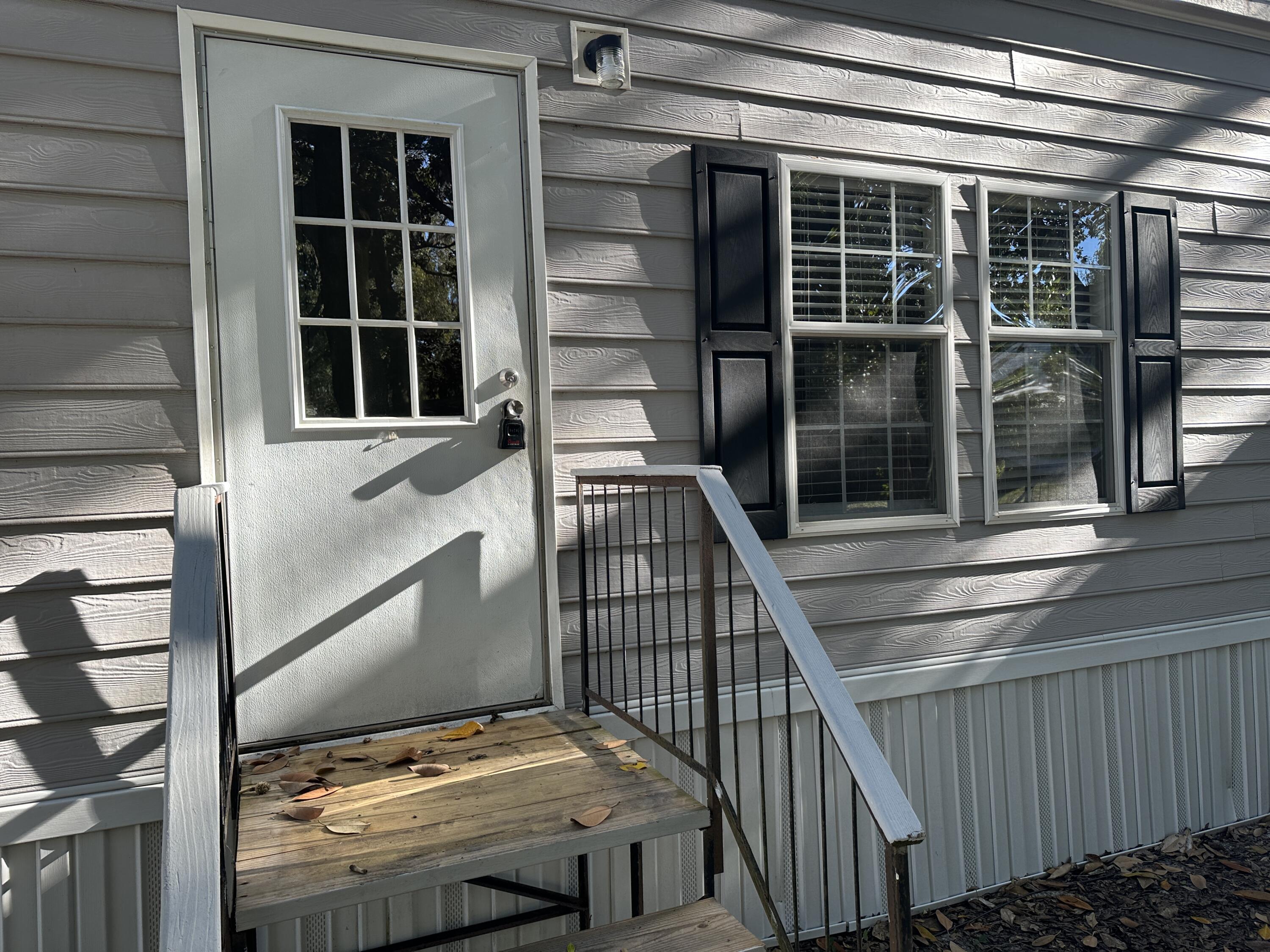 832 Cross Street, Unit A Destin, FL 32541 - Photo 3 of 15 a view of balcony with a potted plant