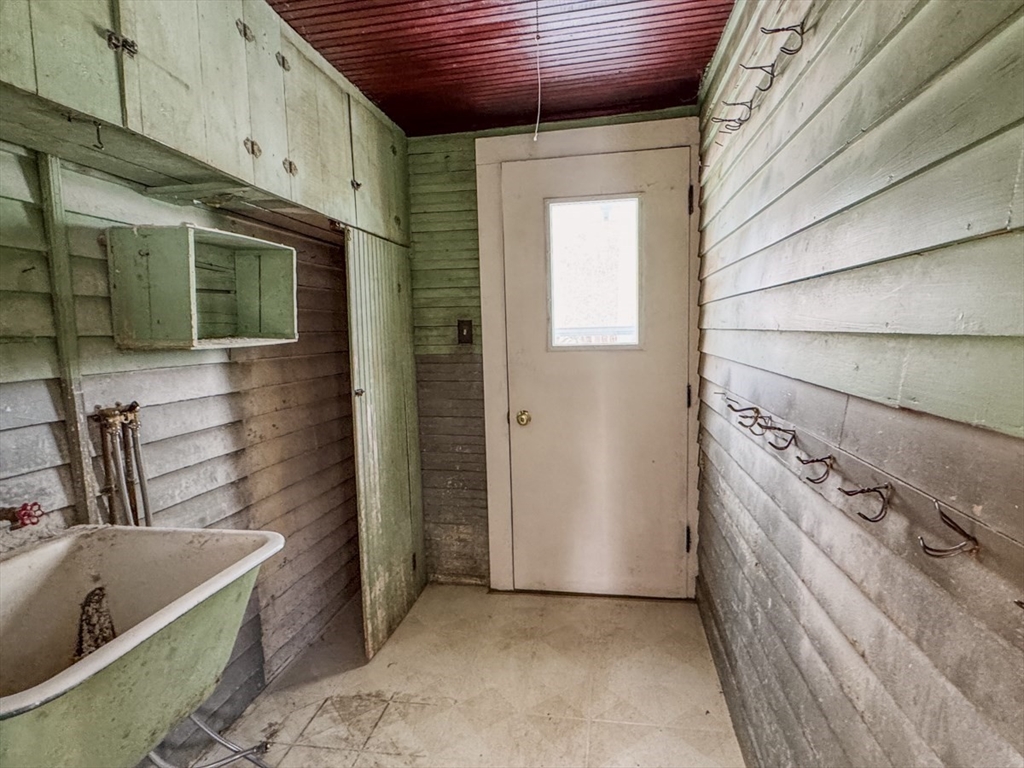 360 Davis Street Greenfield, MA 01301 - Photo 13 of 32 a bathroom with a bathtub sink and toilet