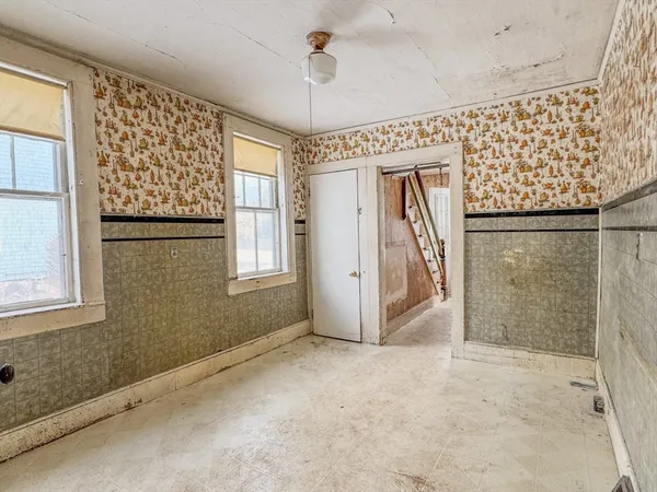 a view of a bedroom from a hallway