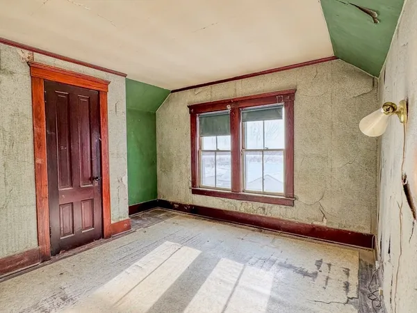 a bathroom with a toilet sink and shower