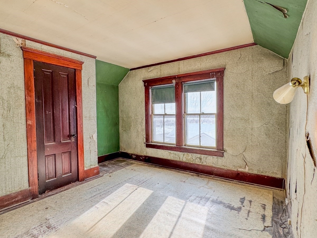 360 Davis Street Greenfield, MA 01301 - Photo 19 of 32 an empty room with window front door