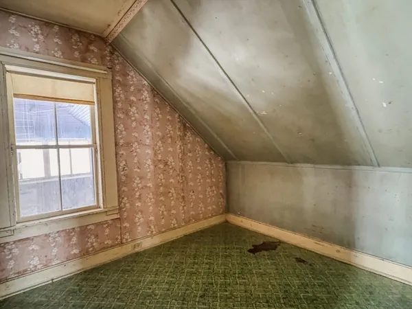 en empty room with windows