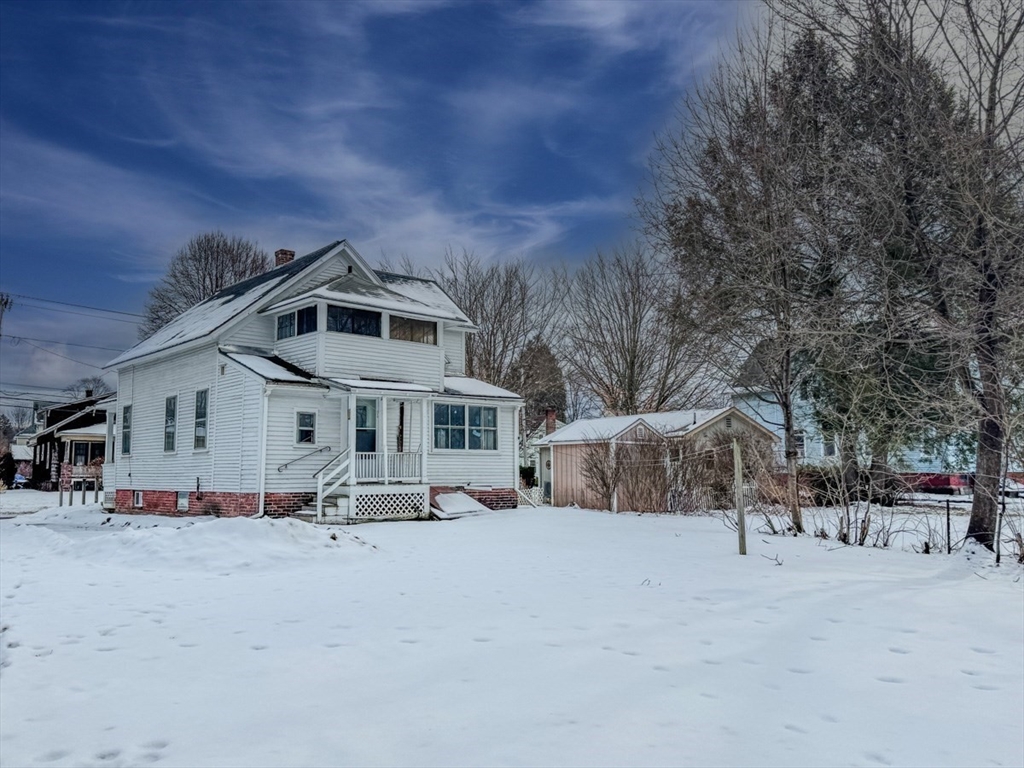 360 Davis Street Greenfield, MA 01301 - Photo 27 of 32 a front view of a house with a yard