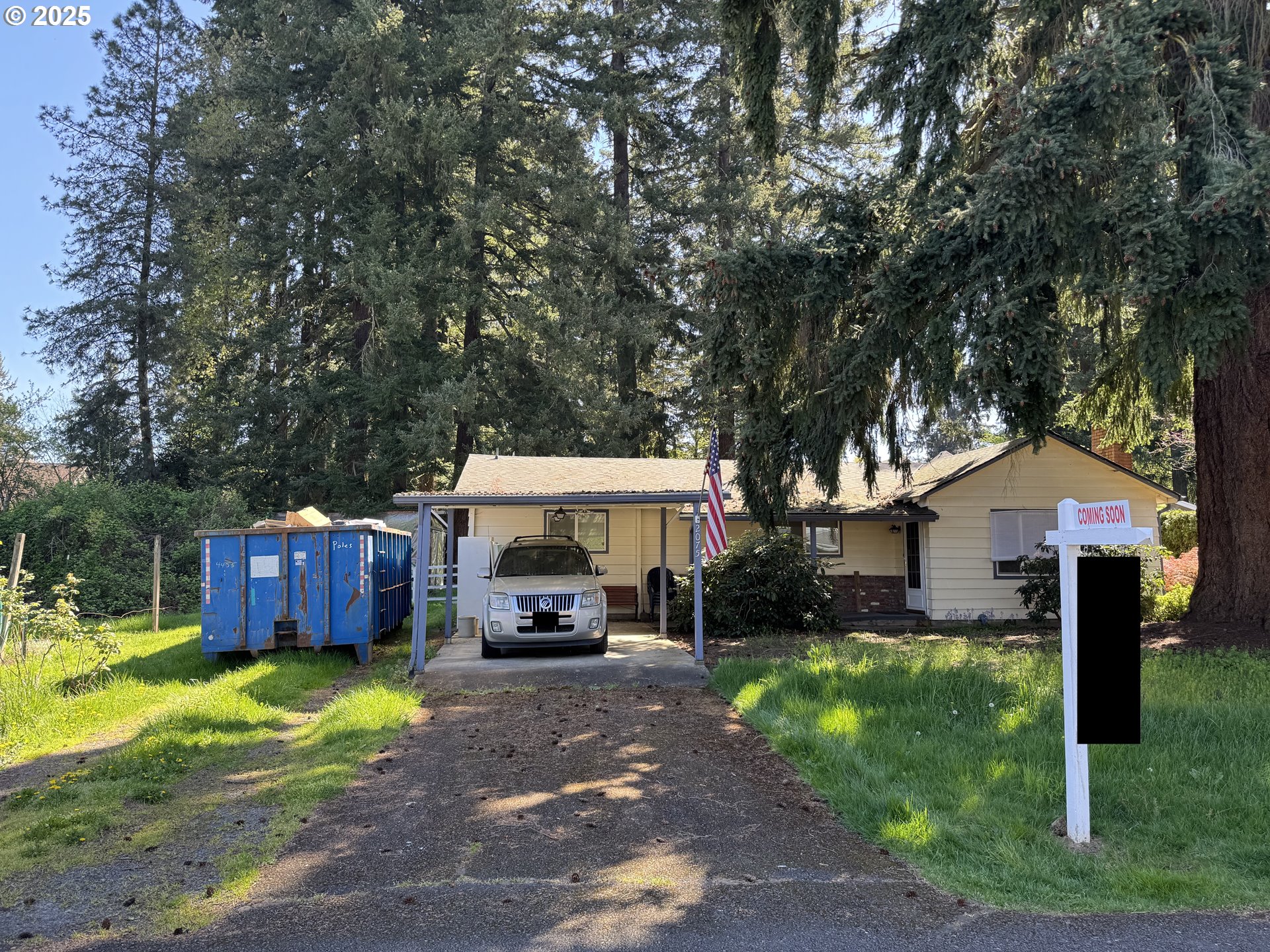 2075 Ostman Road West Linn, OR 97068 - Photo 2 of 12 a front view of a house with a yard table and chairs