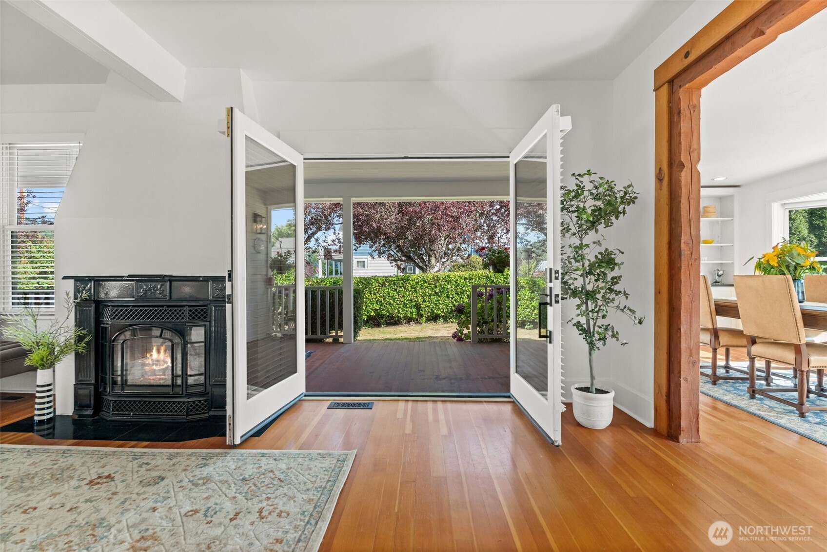 3414 Harborview Drive Gig Harbor, WA 98332 - Photo 14 of 40 a living room with wooden floor and a fireplace