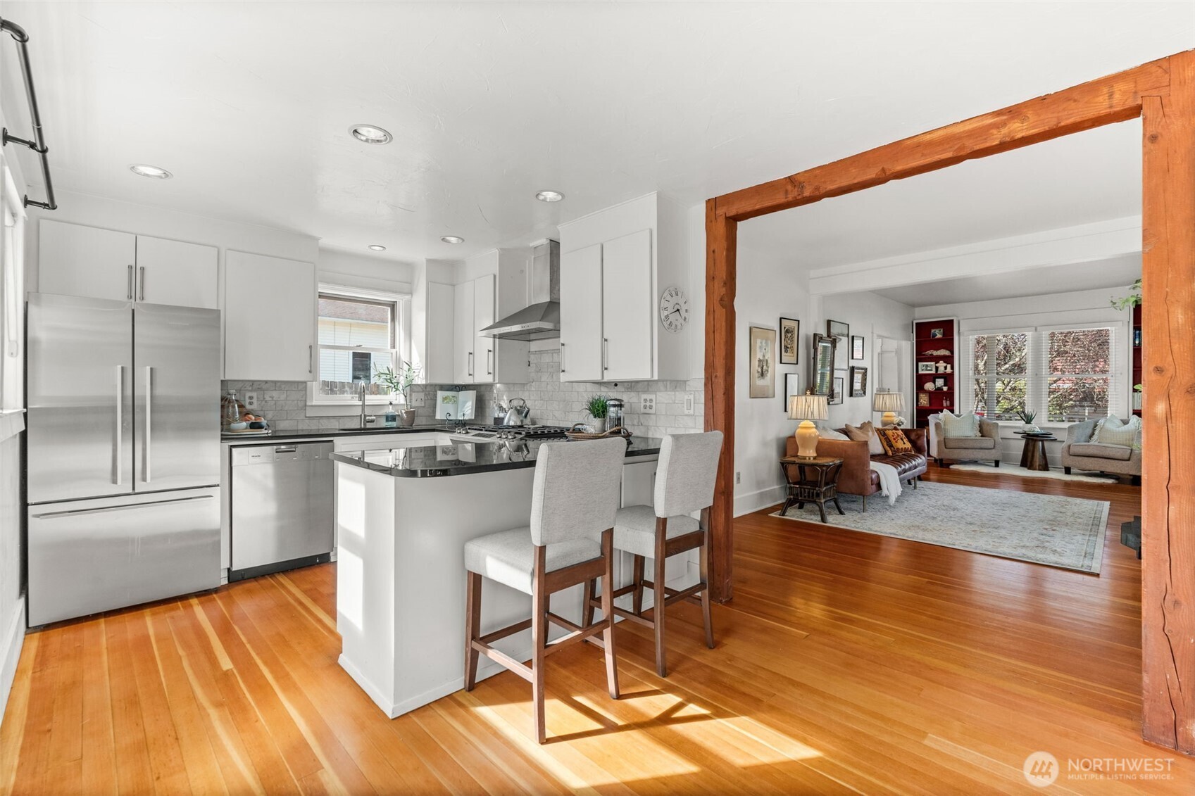 3414 Harborview Drive Gig Harbor, WA 98332 - Photo 18 of 40 a kitchen with counter top space a sink cabinets and stainless steel appliances