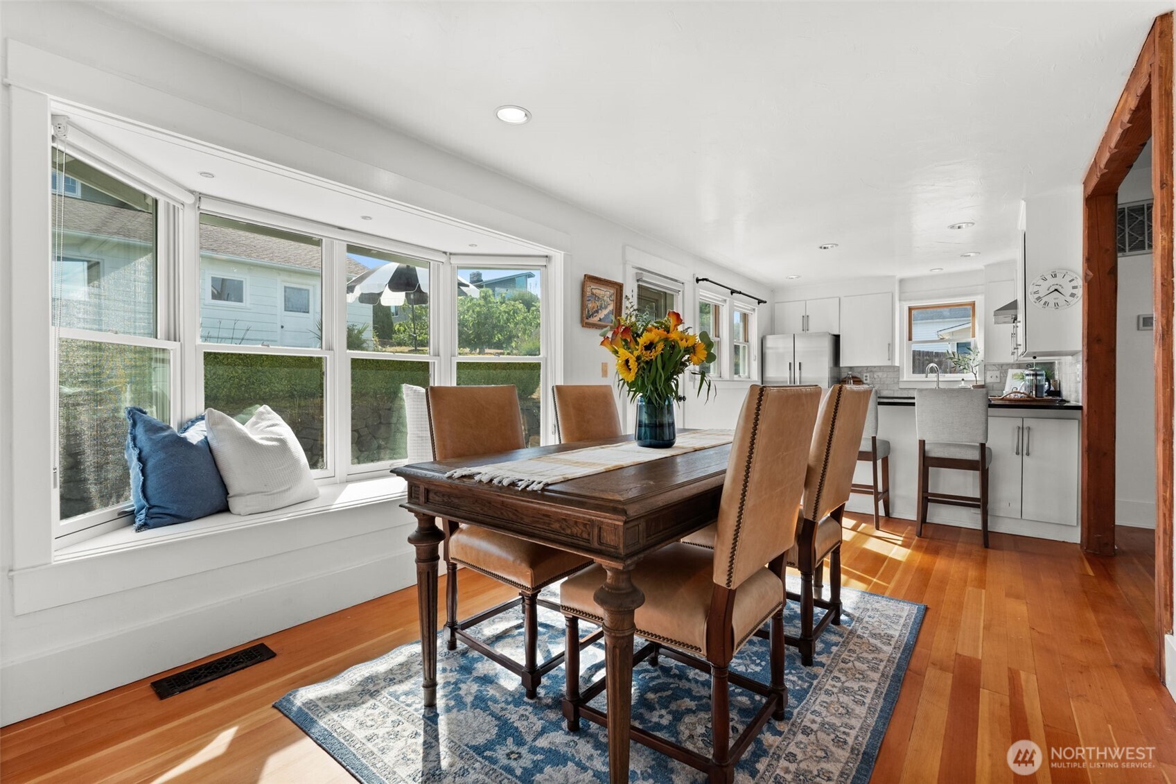 3414 Harborview Drive Gig Harbor, WA 98332 - Photo 24 of 40 a view of a dining room with furniture and wooden floor