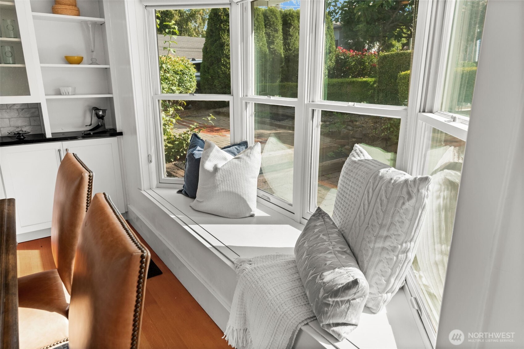3414 Harborview Drive Gig Harbor, WA 98332 - Photo 25 of 40 a dining room with furniture and a floor to ceiling window