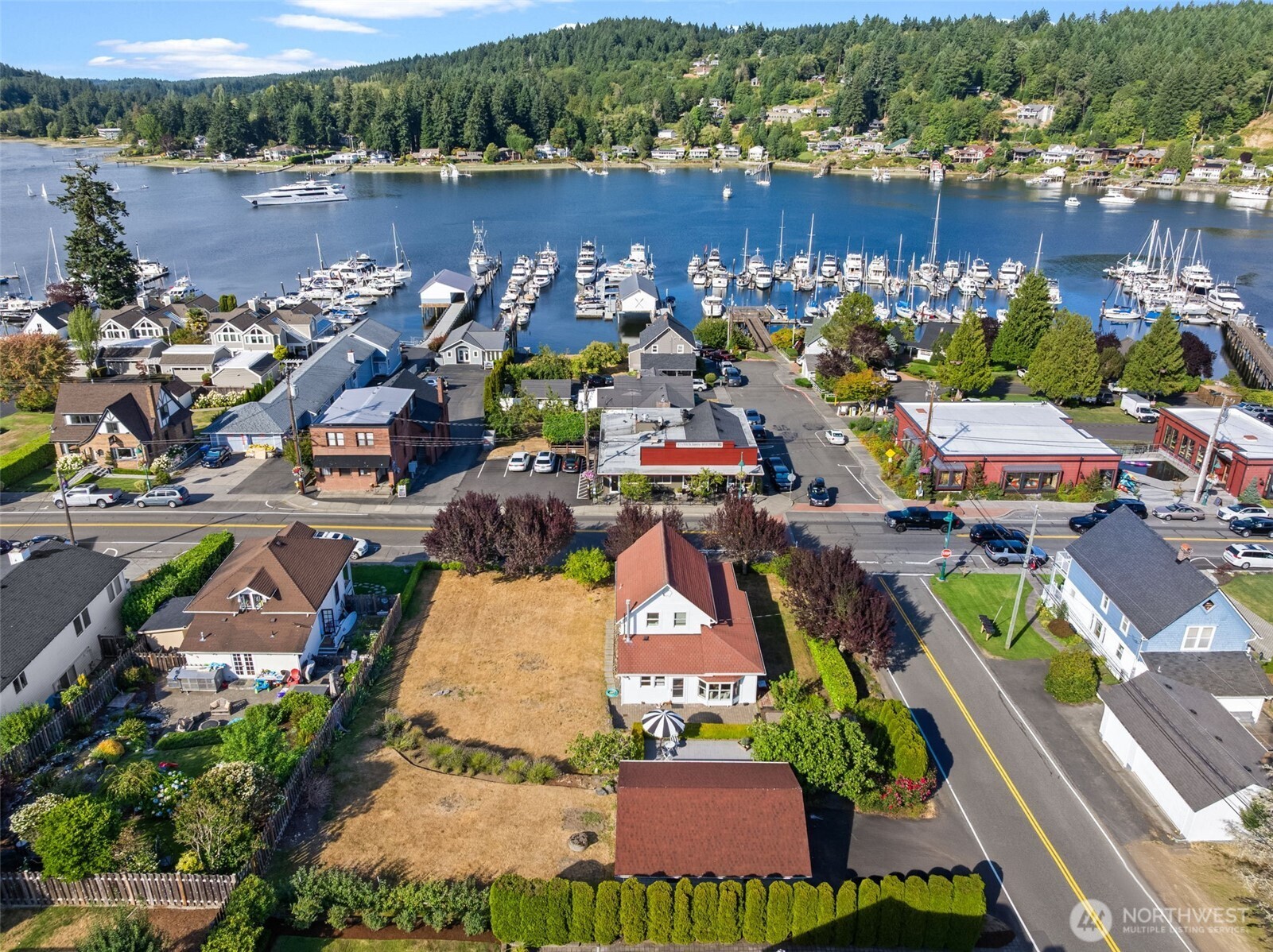 3414 Harborview Drive Gig Harbor, WA 98332 - Photo 3 of 40 an aerial view of a house with outdoor space and lake view