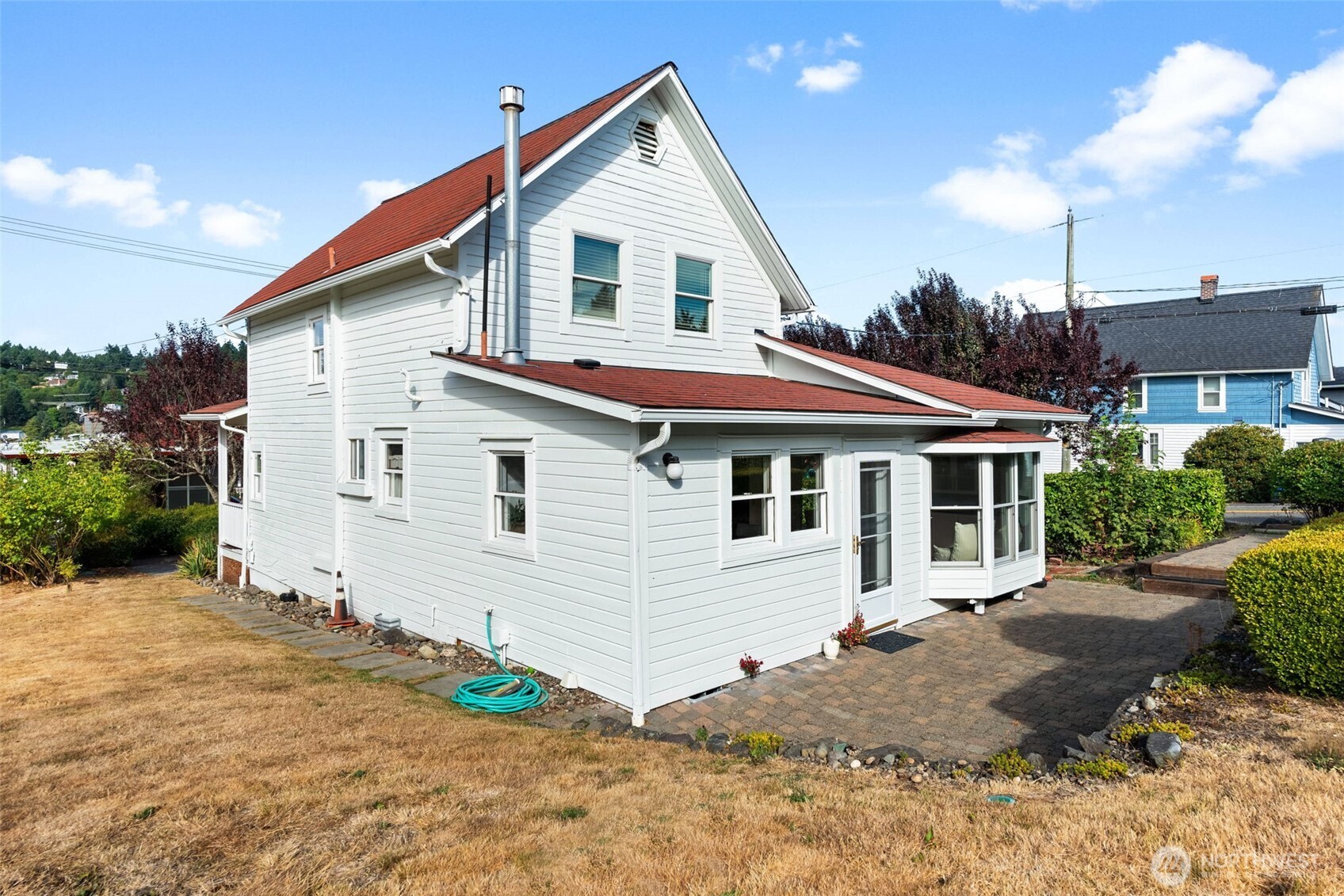 3414 Harborview Drive Gig Harbor, WA 98332 - Photo 34 of 40 a front view of a house with a yard and garage