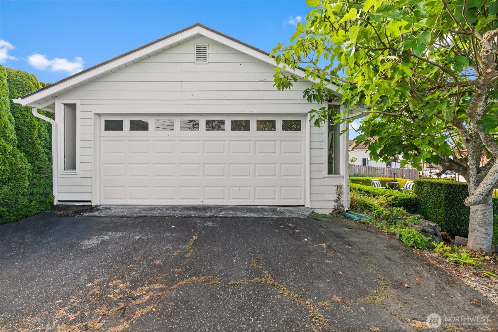 3414 Harborview Drive Gig Harbor, WA 98332 - Photo 38 of 40 a front view of a house with a yard