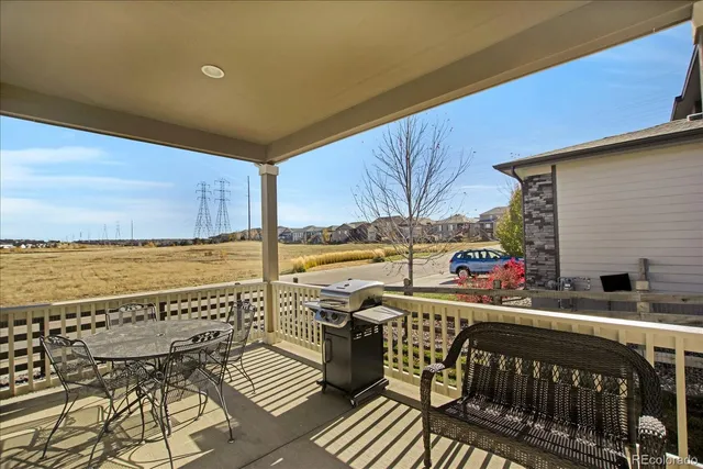 a view of a balcony with ocean view