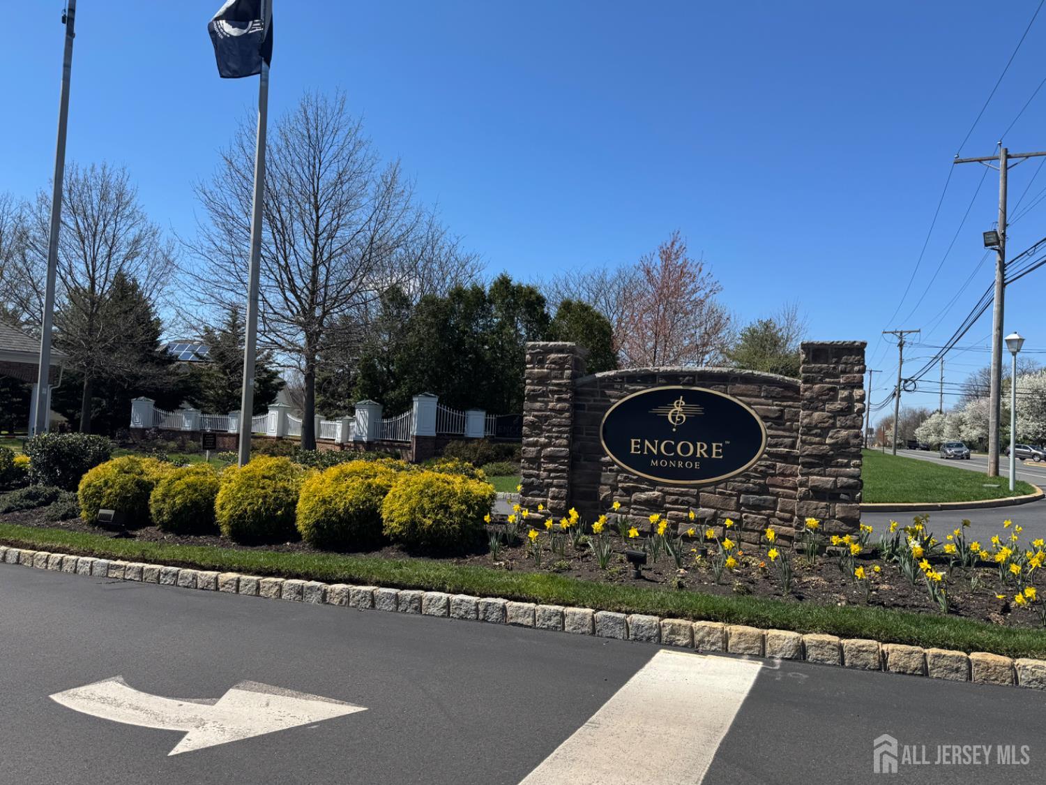 255 Spring Meadow Way Monroe Township, NJ 08831 - Photo 22 of 25 a view of swimming pool outdoor seating and city view