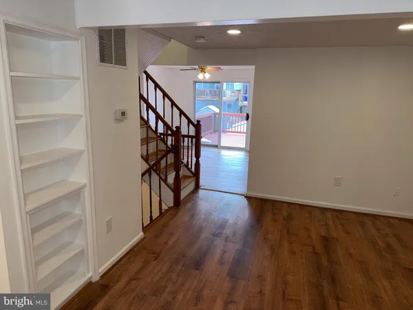 a view of entryway with wooden floor
