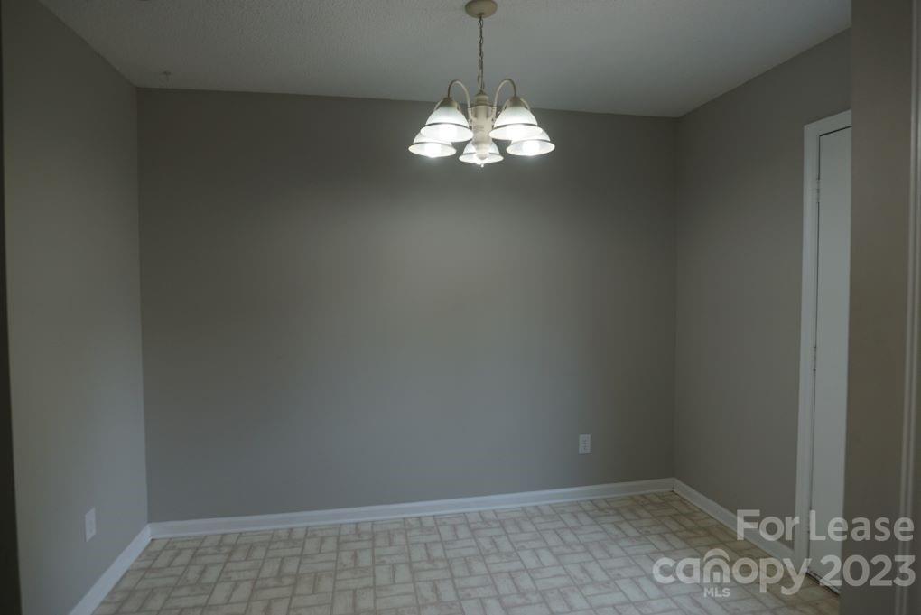 1105 3rd Avenue Southwest Hickory, NC 28602 - Photo 3 of 10 a view of a chandelier in a room
