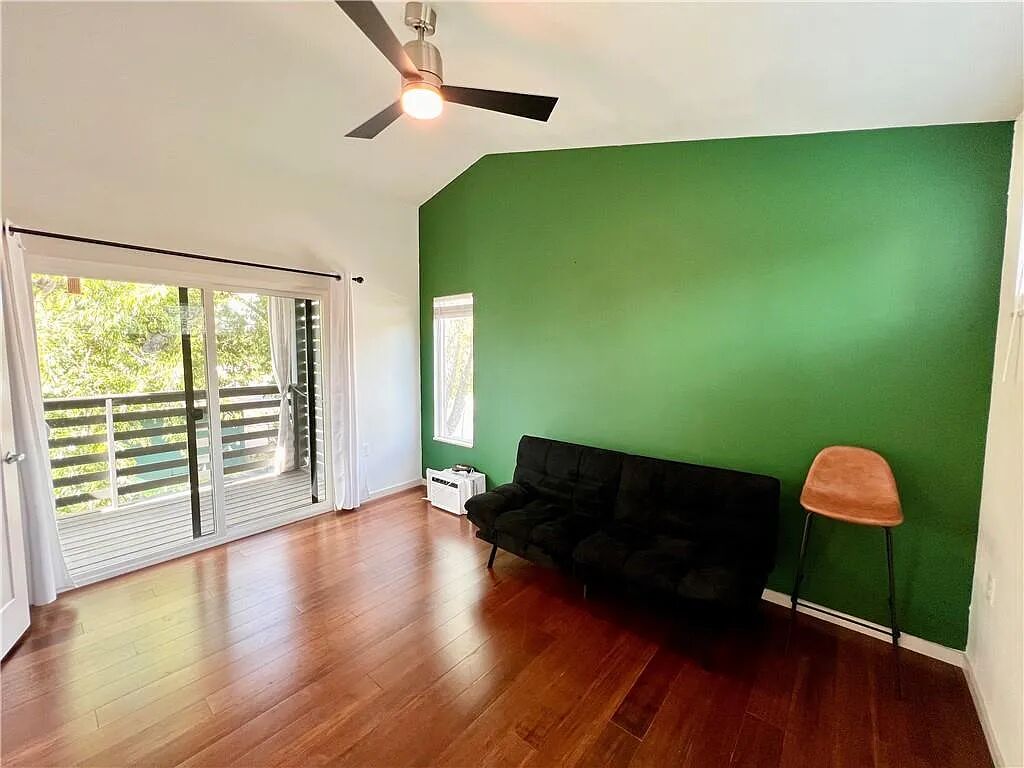 4601 Kitty Avenue, Unit B Austin, TX 78721 - Photo 10 of 14 Bedroom #3 upstairs has a balcony overlooking the backyard.