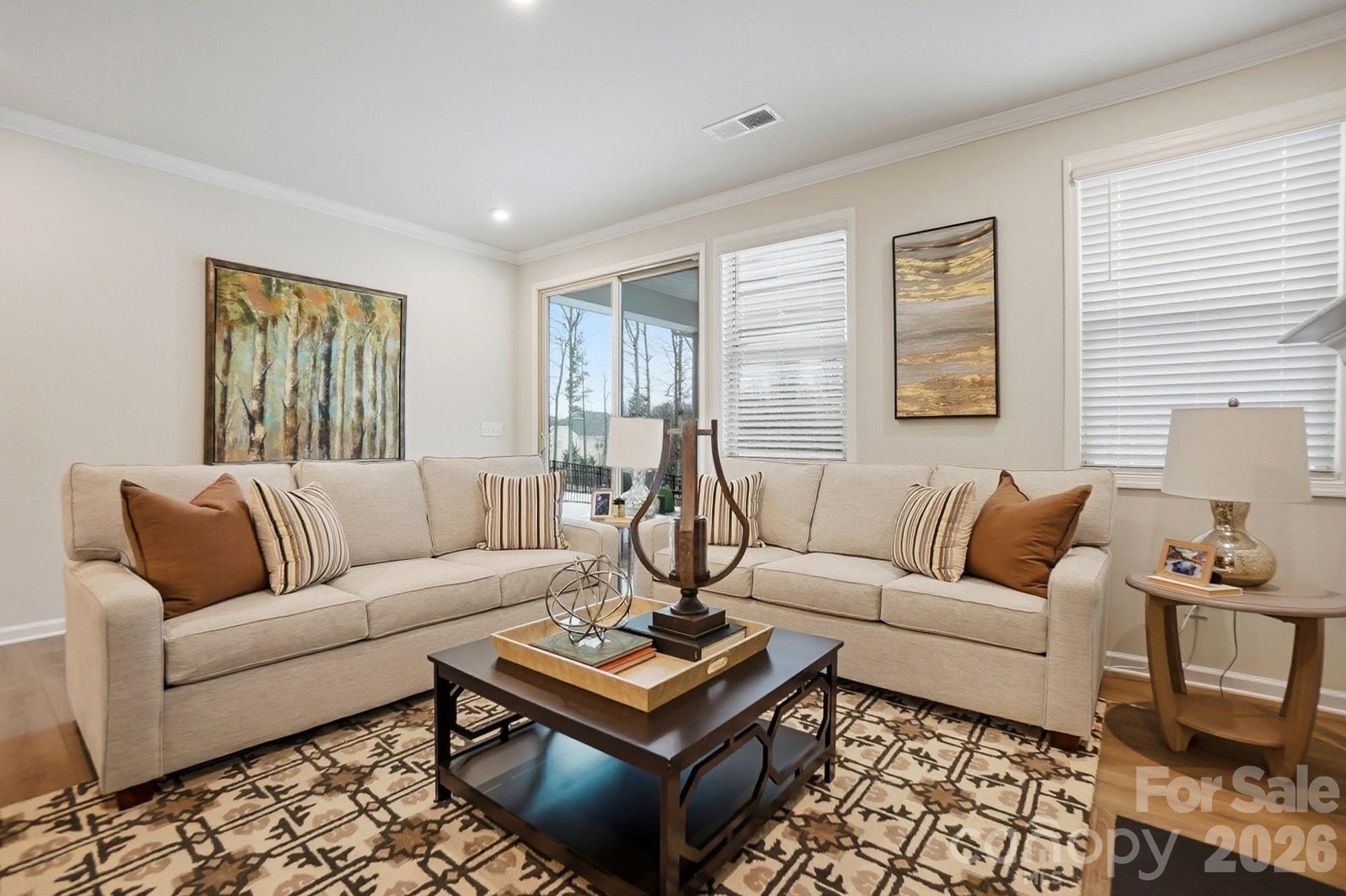 9931 Cask Way Huntersville, NC 28078 - Photo 15 of 42 a living room with furniture a rug and a window