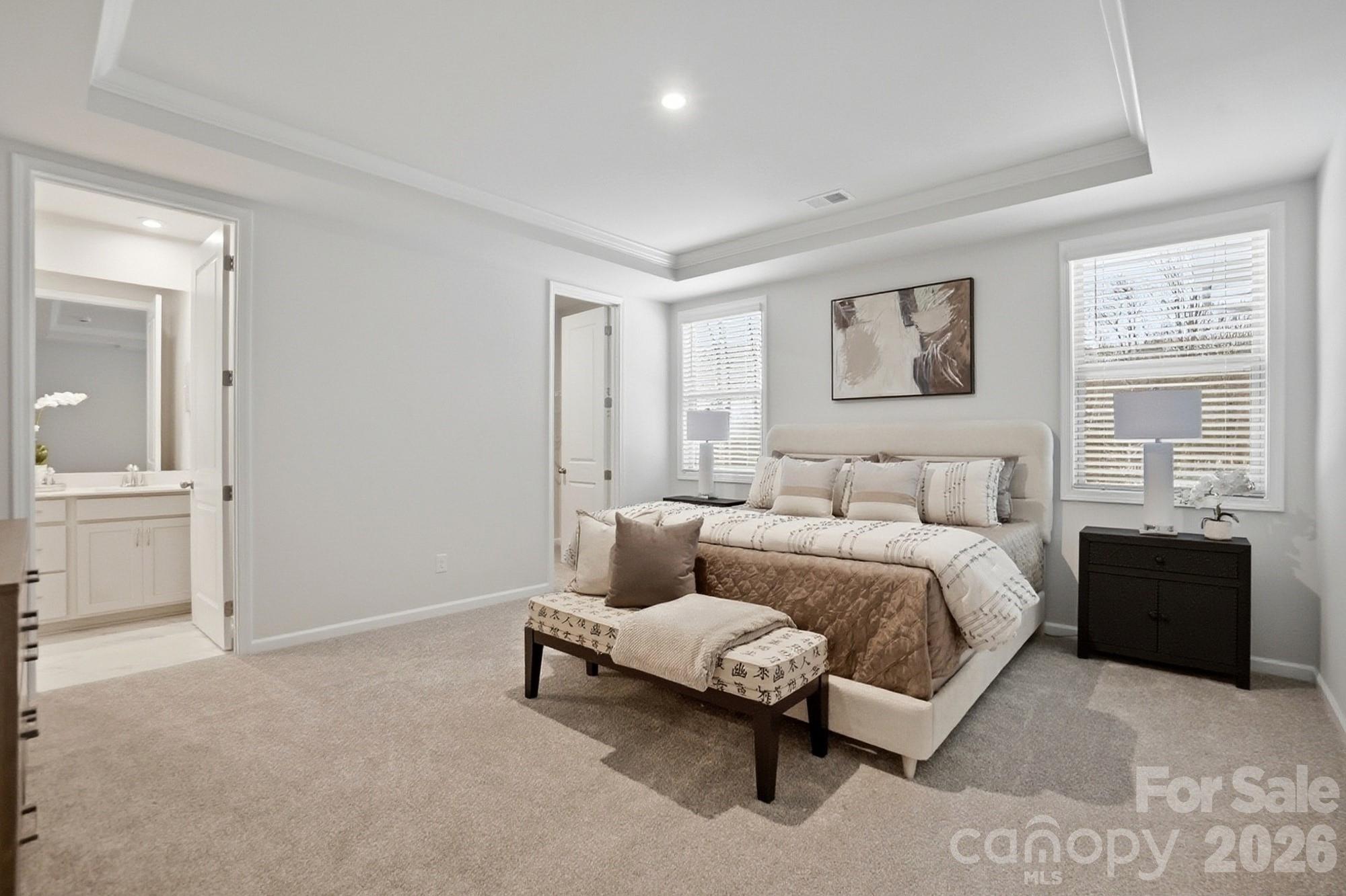 9931 Cask Way Huntersville, NC 28078 - Photo 19 of 42 a bedroom with a bed and a couch