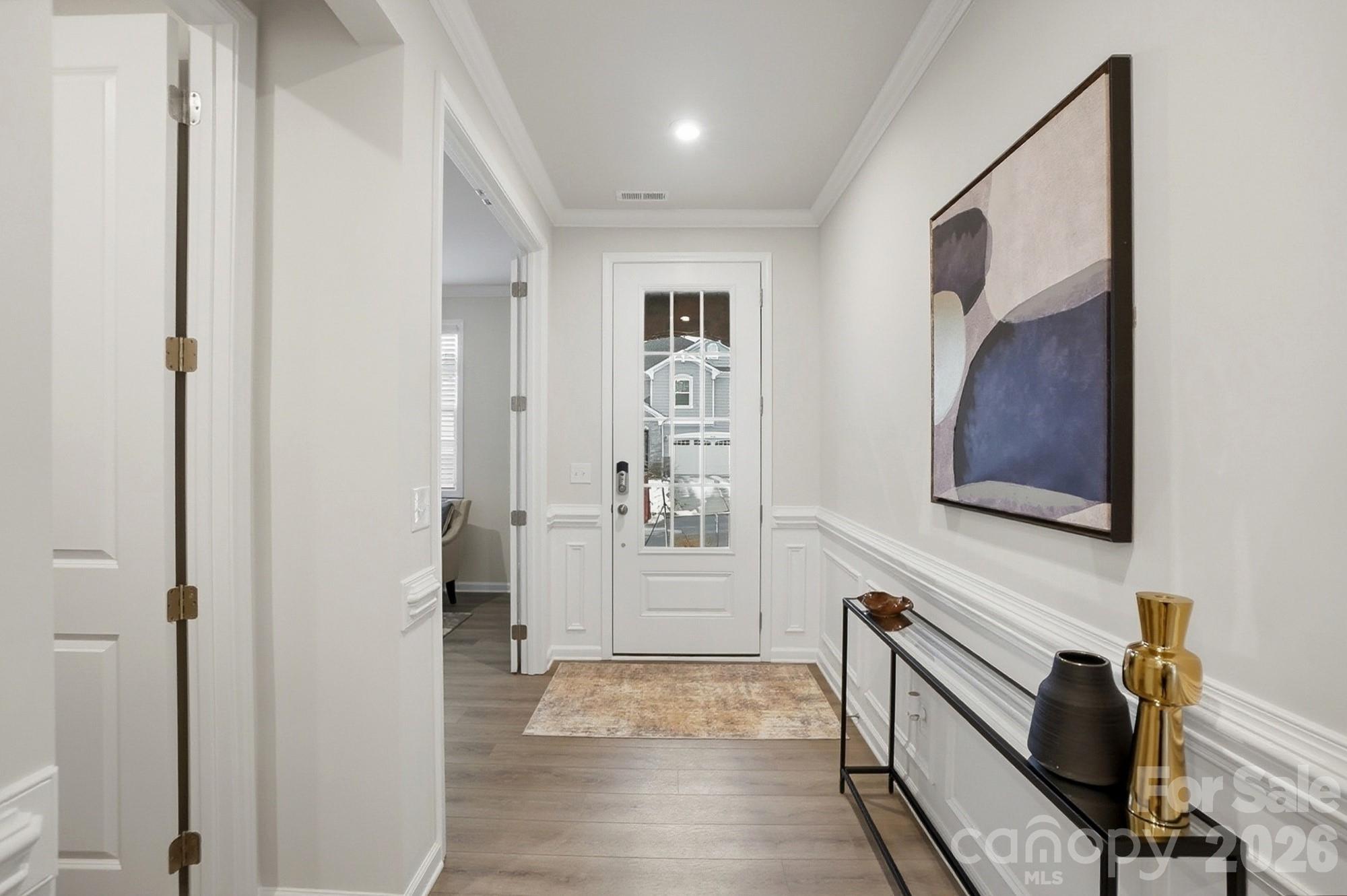 9931 Cask Way Huntersville, NC 28078 - Photo 2 of 42 a view of an entryway with wooden floor