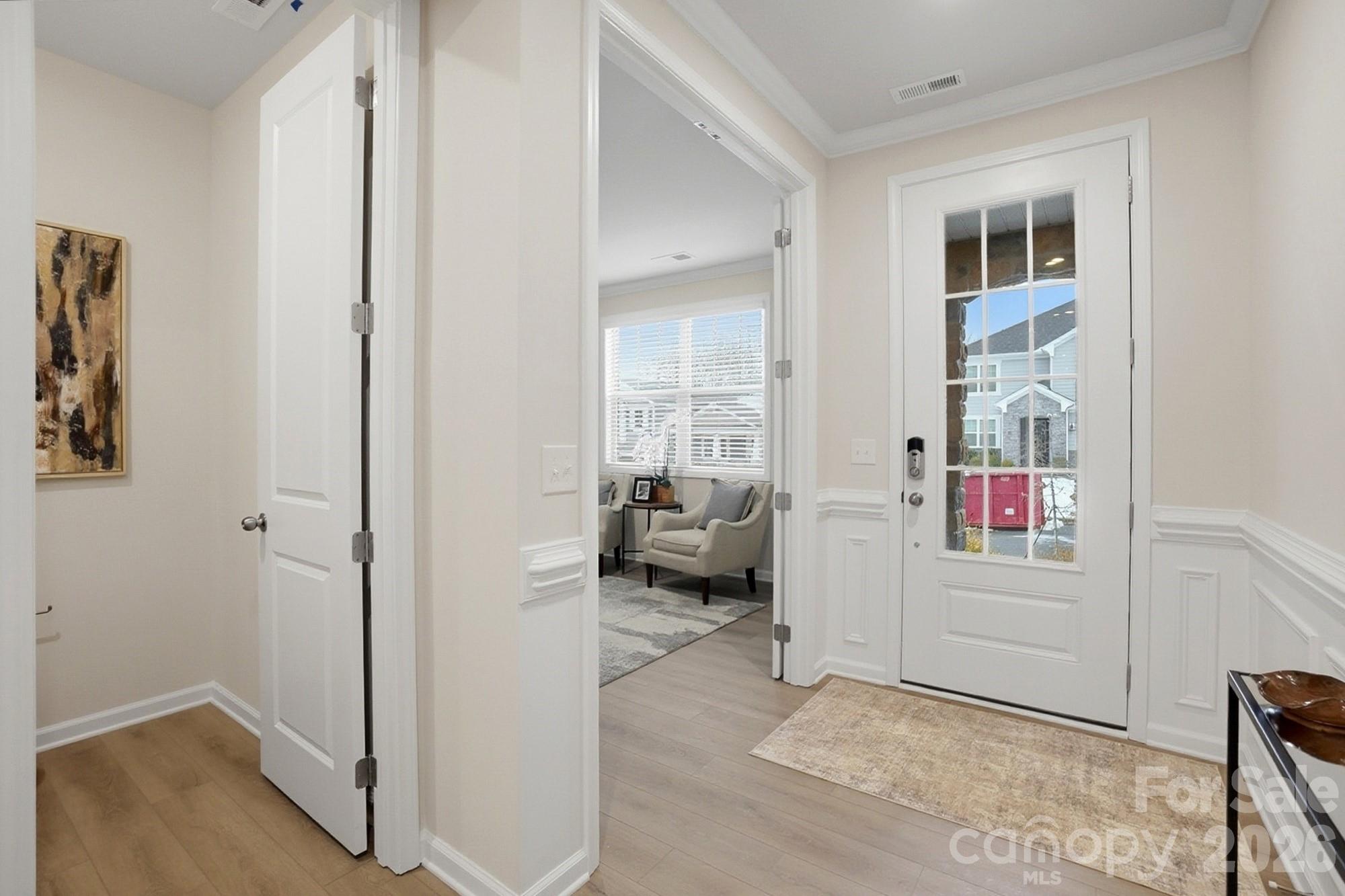 9931 Cask Way Huntersville, NC 28078 - Photo 3 of 42 a living room with furniture and a window