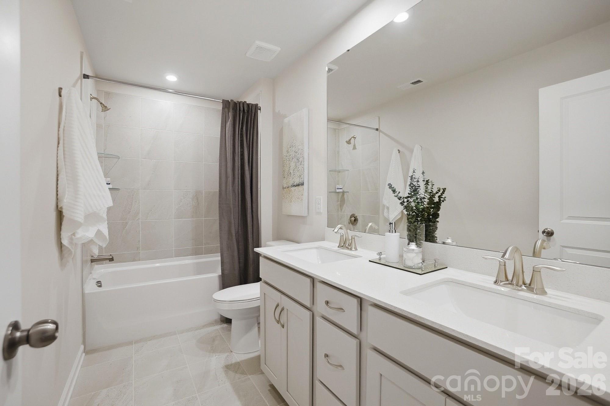 9931 Cask Way Huntersville, NC 28078 - Photo 34 of 42 a bathroom with a granite countertop sink toilet and shower