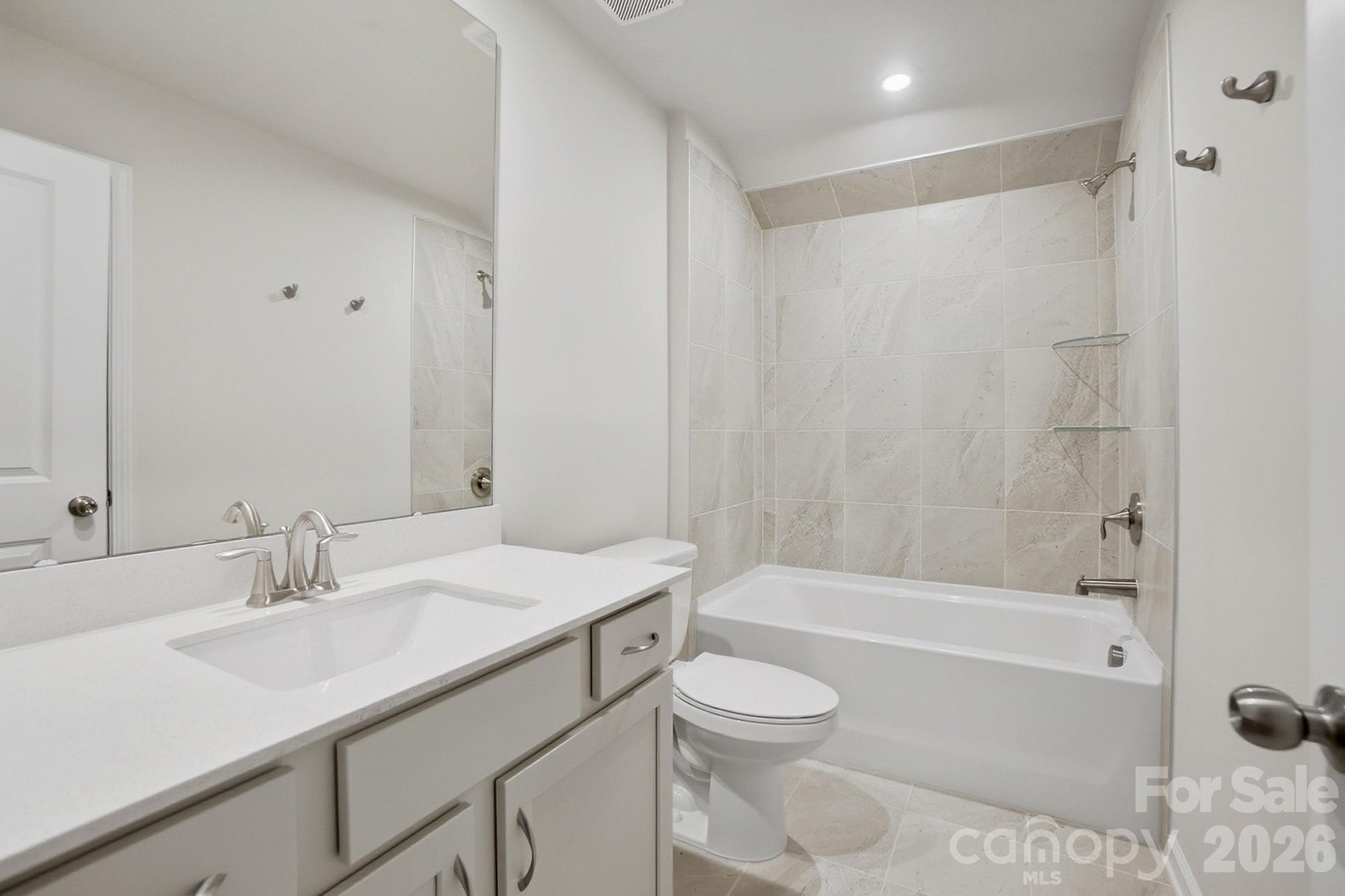 9931 Cask Way Huntersville, NC 28078 - Photo 38 of 42 a bathroom with a sink toilet and shower