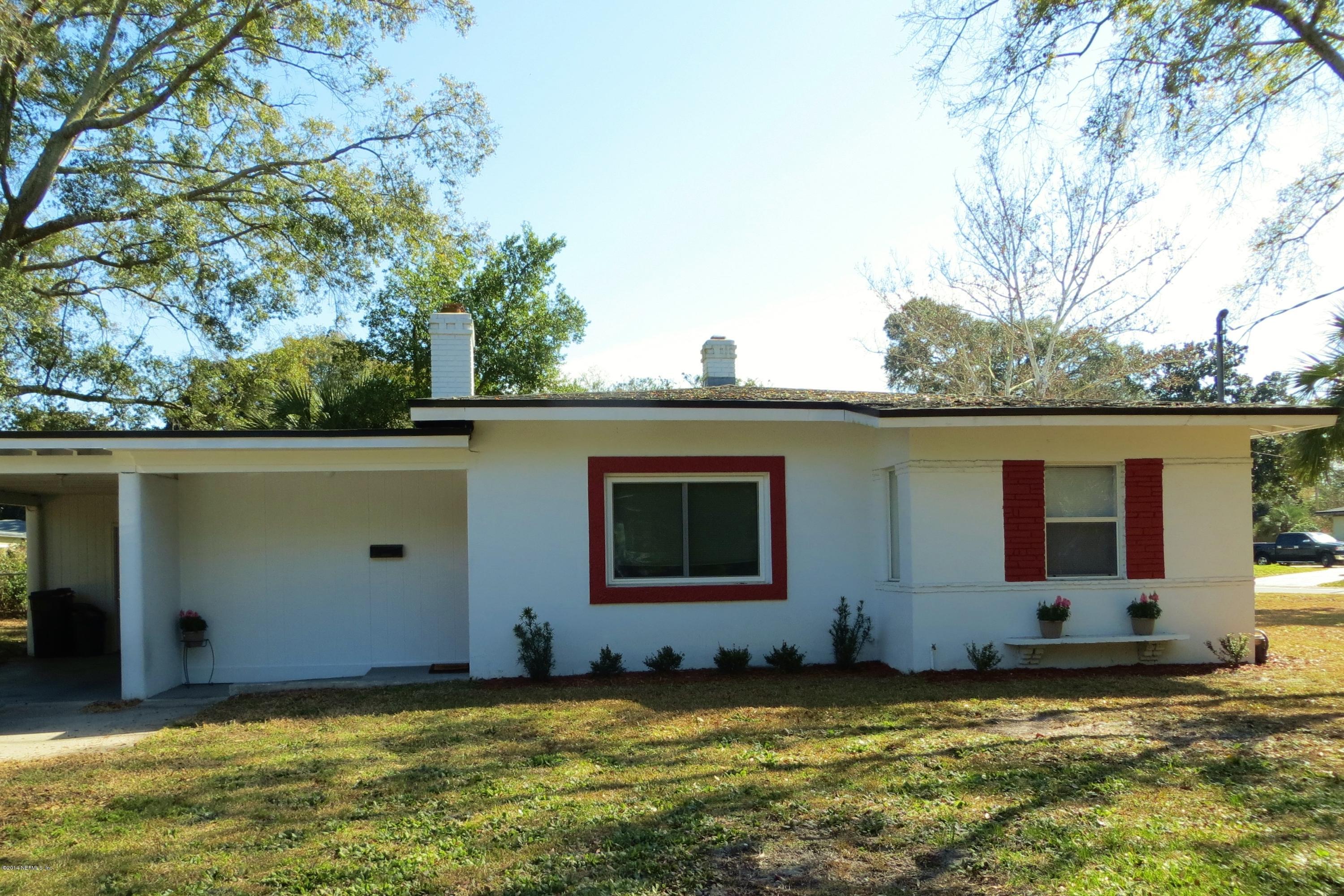 6025 Stetson Road Jacksonville, FL 32217 - Photo 1 of 13 a view of a house with yard and a tree