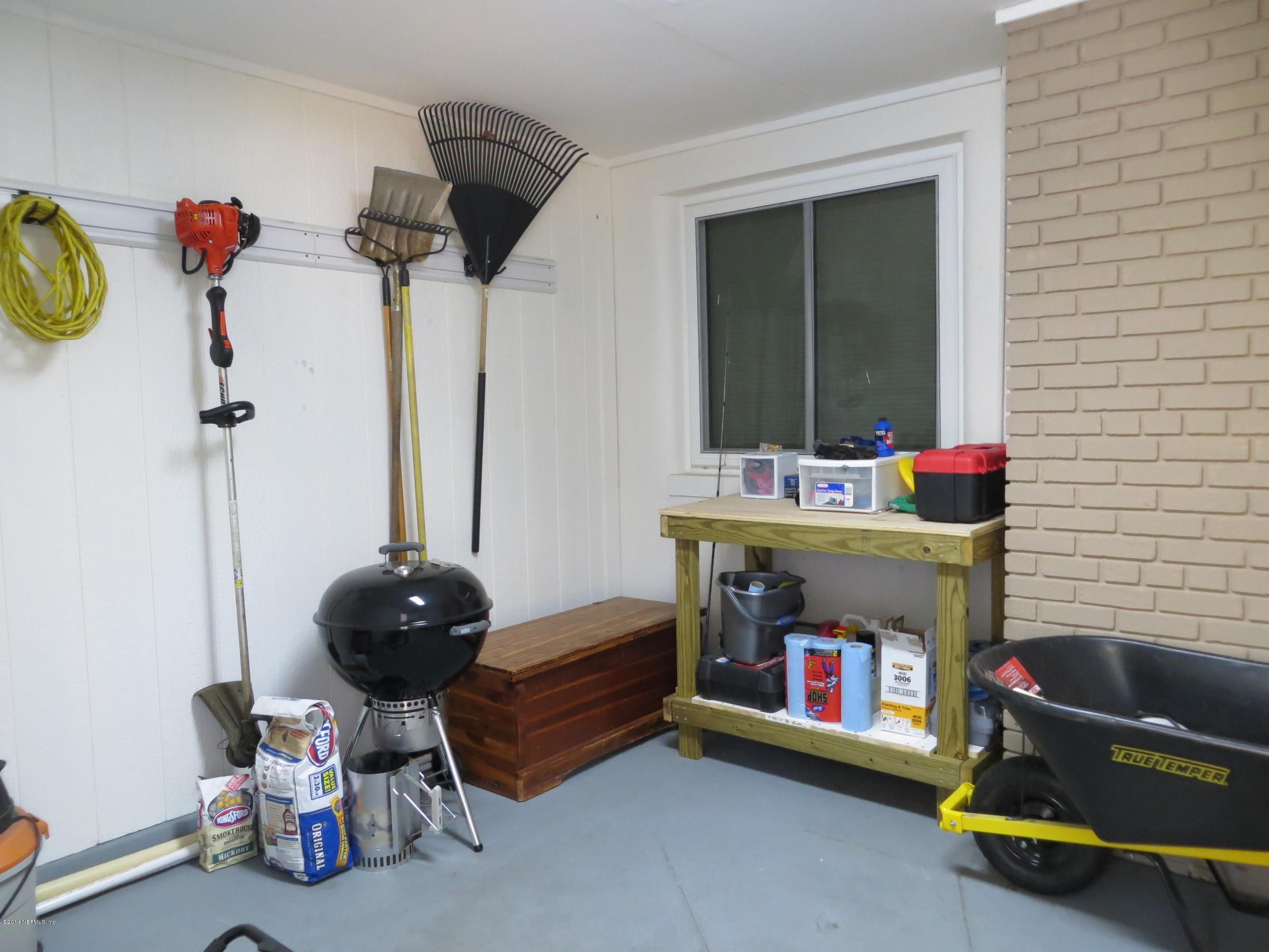 6025 Stetson Road Jacksonville, FL 32217 - Photo 11 of 13 a room with furniture and toys
