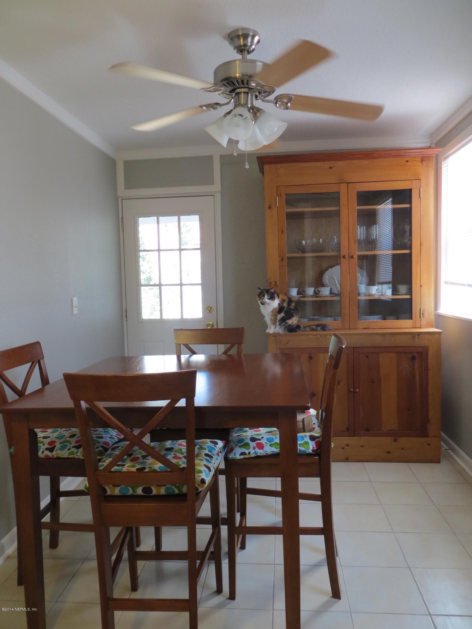 6025 Stetson Road Jacksonville, FL 32217 - Photo 4 of 13 a view of a dining room with furniture and window