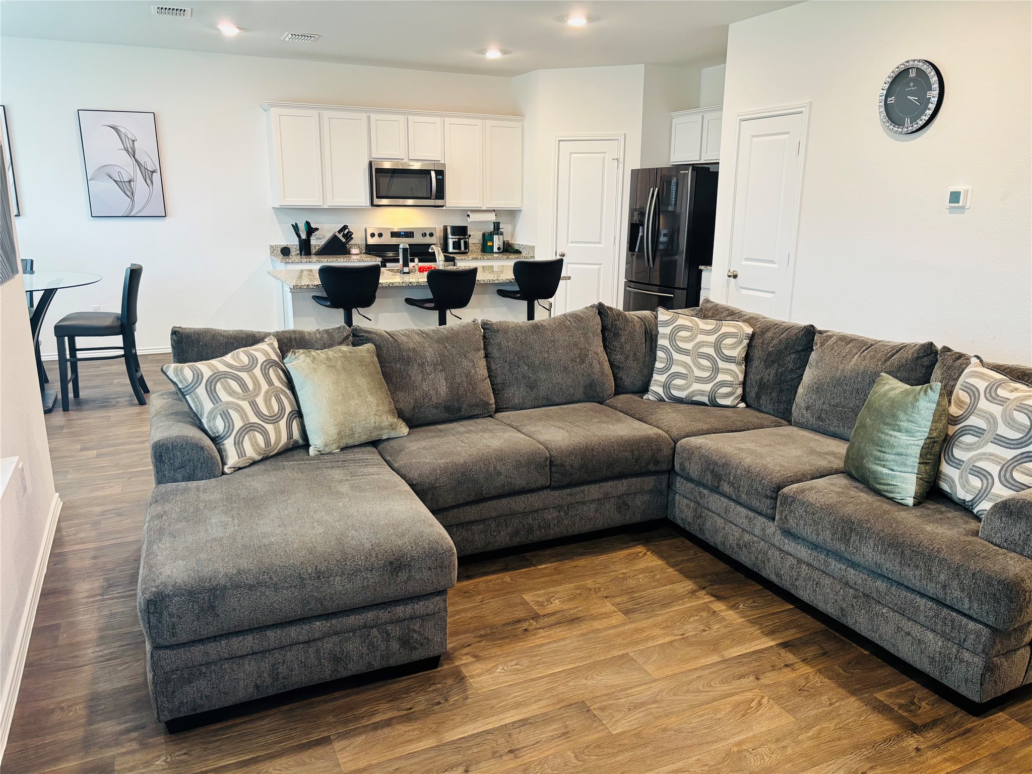 14817 Perlino Way, Unit A Manor, TX 78653 - Photo 3 of 40 a living room with furniture kitchen view and a couch