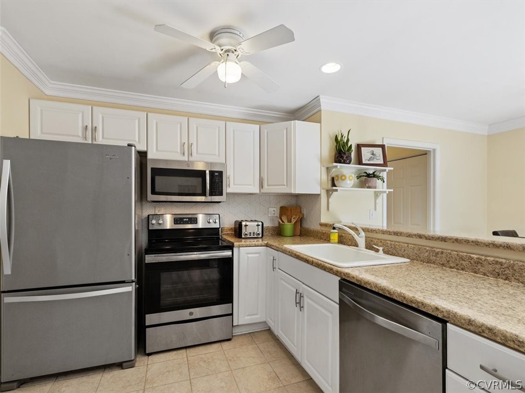 5807 Mill Spring Road Midlothian, VA 23112 - Photo 10 of 33 Kitchen with Stainless Steel Appliances & Tile Flo
