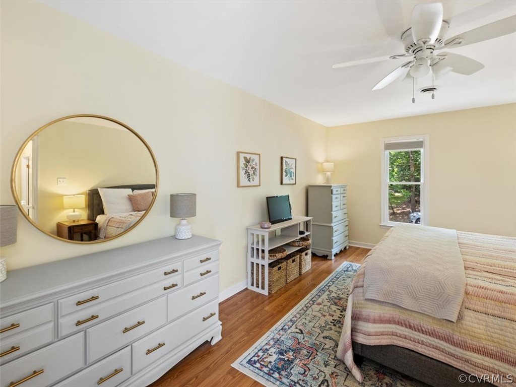 5807 Mill Spring Road Midlothian, VA 23112 - Photo 21 of 33 Primary Bedroom with Laminate Plank Floor, Ceiling