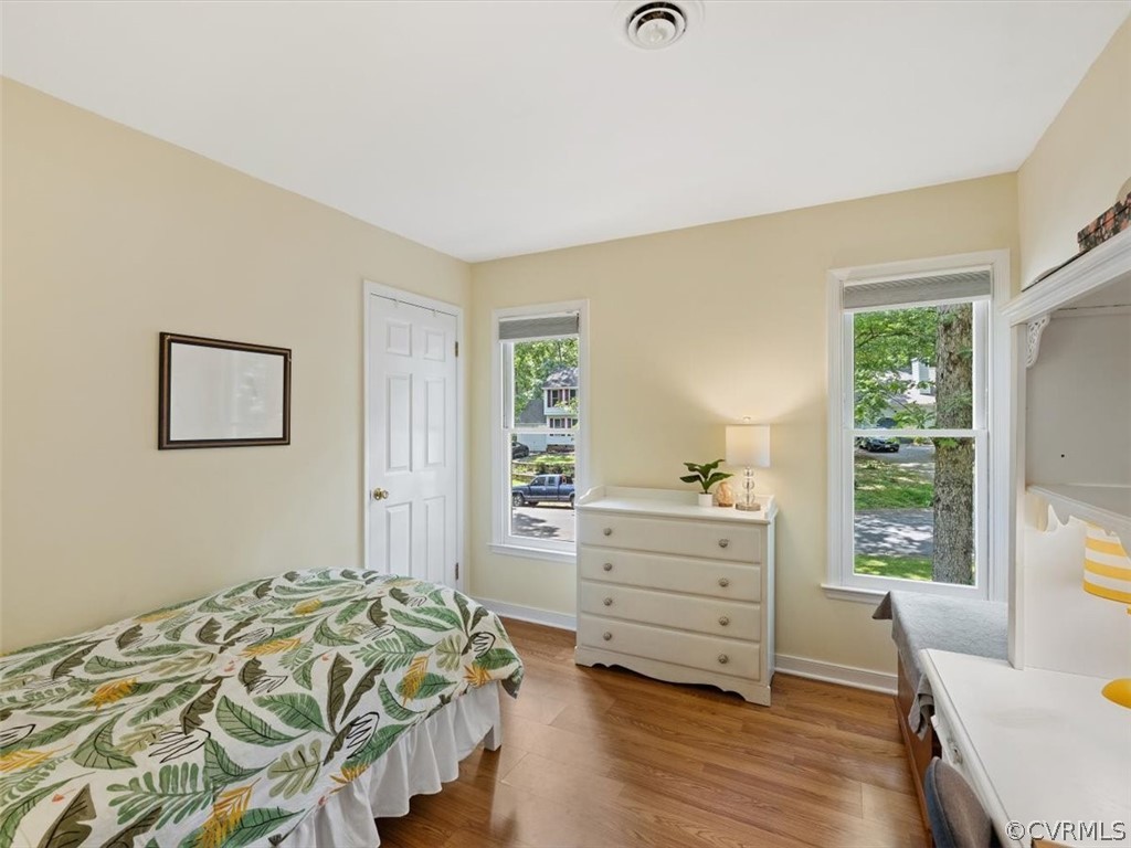 5807 Mill Spring Road Midlothian, VA 23112 - Photo 24 of 33 Second Bedroom with Laminate Plank Floor and Close
