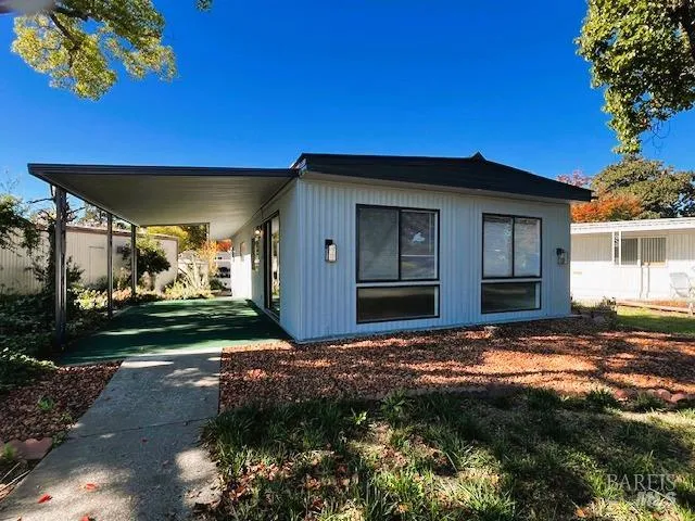 a view of a house with a patio