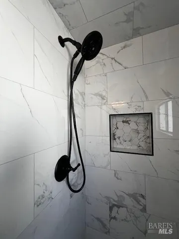 a bed room with a bed and a dresser