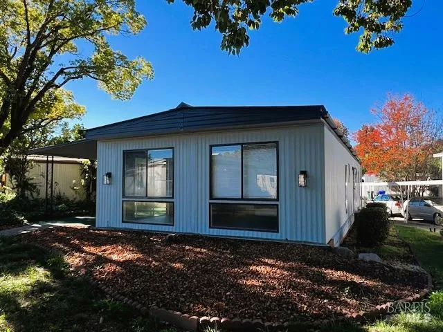 a view of a city with a lake