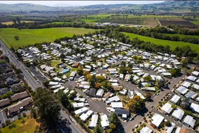 a view of a swimming pool with a patio