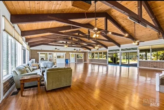 a view of a swimming pool with a patio